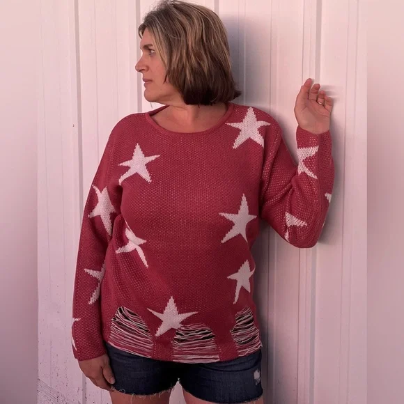 Distressed star sweater